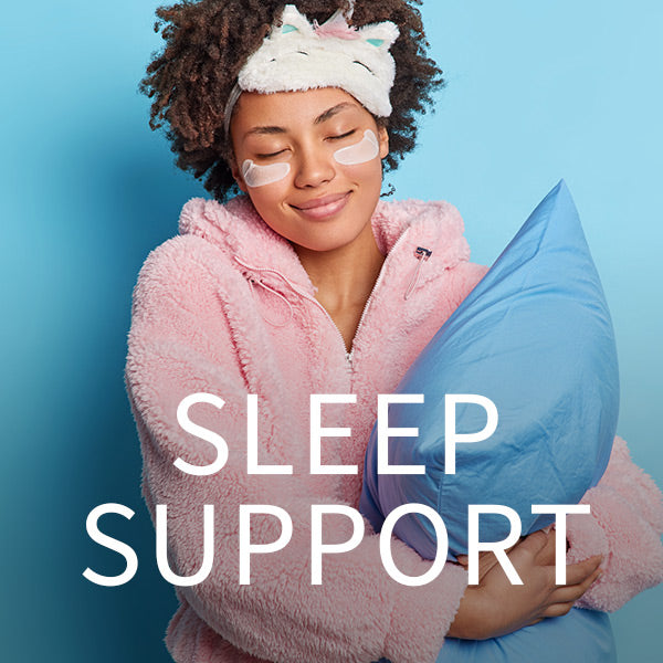 woman in pink robe holding blue pillow with sleep support in white font